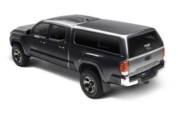 ARE CX REVO FIBERGLASS CAB HIGH TRUCK CAP ON TOYOTA TACOMA GREY DS REAR QRT