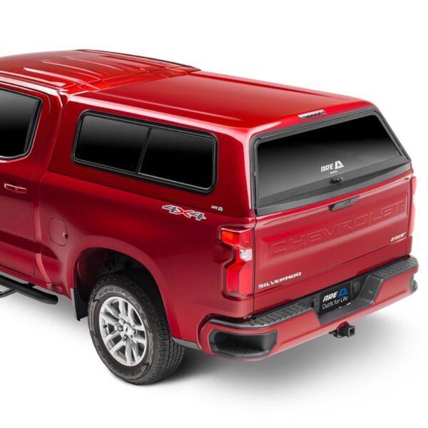 ARE V SERIES TRUCK CAP ON SILVERADO RED REAR QTR HERO