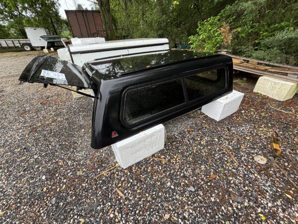 USED LEER 100XR TRUCK CAP 2016 TOYOTA TACOMA SHORT BED EXTENDED CAB - RXF TEXTURED BLACK - 24638941